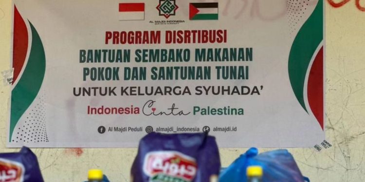 penyaluran bantuan Sembako Makanan Pokok dan Santunan Tunai
